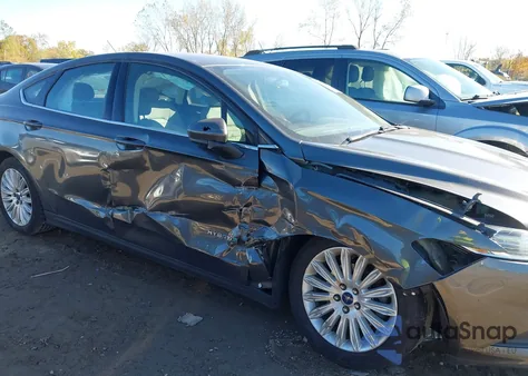 2016 Ford Fusion Hybrid S z USA, uszkodzony, nr VIN 3FA6P0UU0GR292719